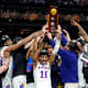Apr 4, 2022; New Orleans, LA, USA; The Kansas Jayhawks celebrate after defeating the North Carolina Tar Heels during the 2022 NCAA men's basketball tournament Final Four championship game at Caesars Superdome. Stephen Lew-USA TODAY Sports